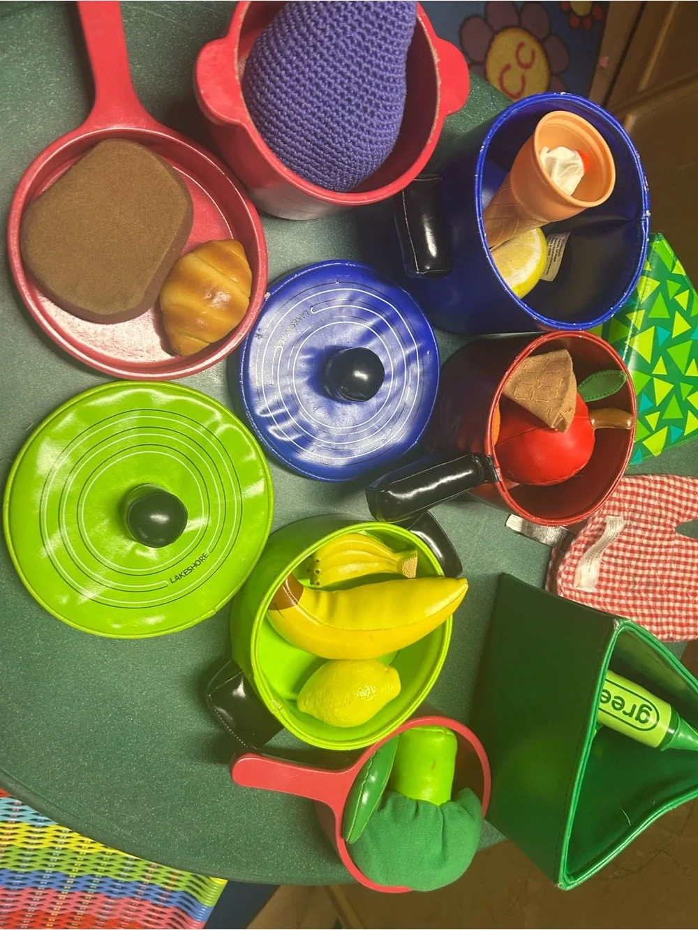 Kitchen play- colorful pans, food and wooden mixer